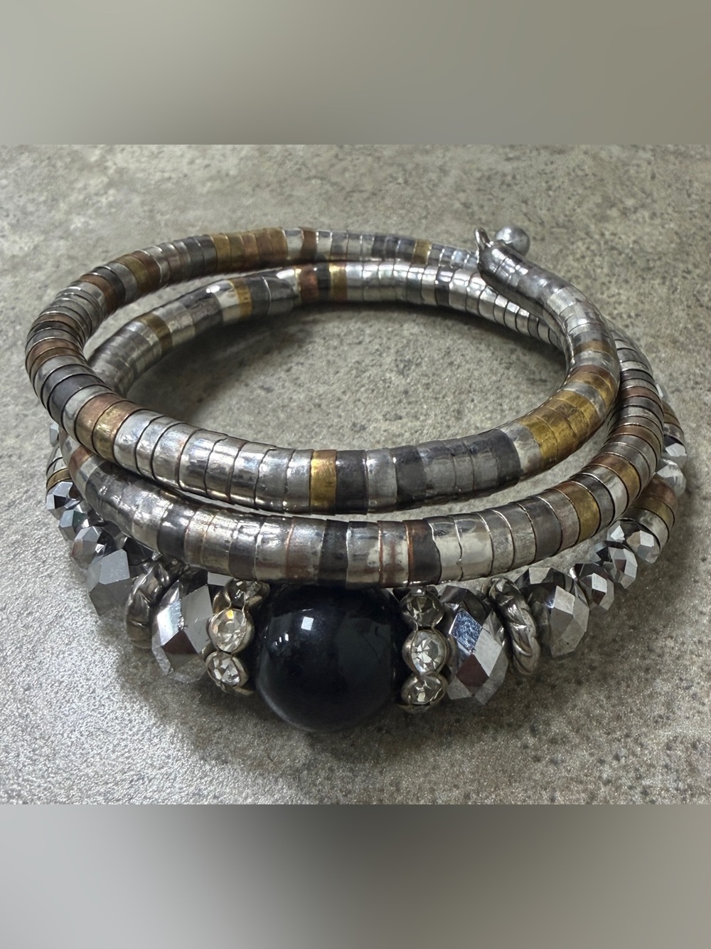 Multi-Tone Beaded Coil Bracelet with Black Accent Bead can be wear a a chocker